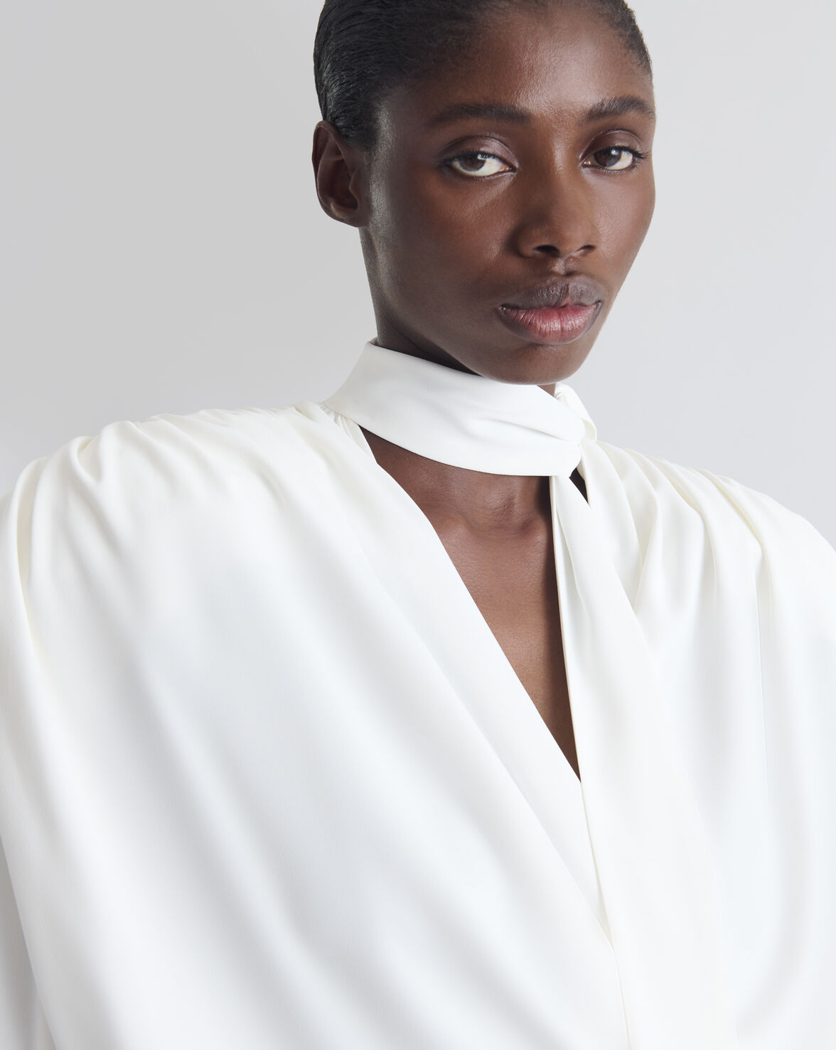 DRAPED BLOUSE WITH TIED COLLAR